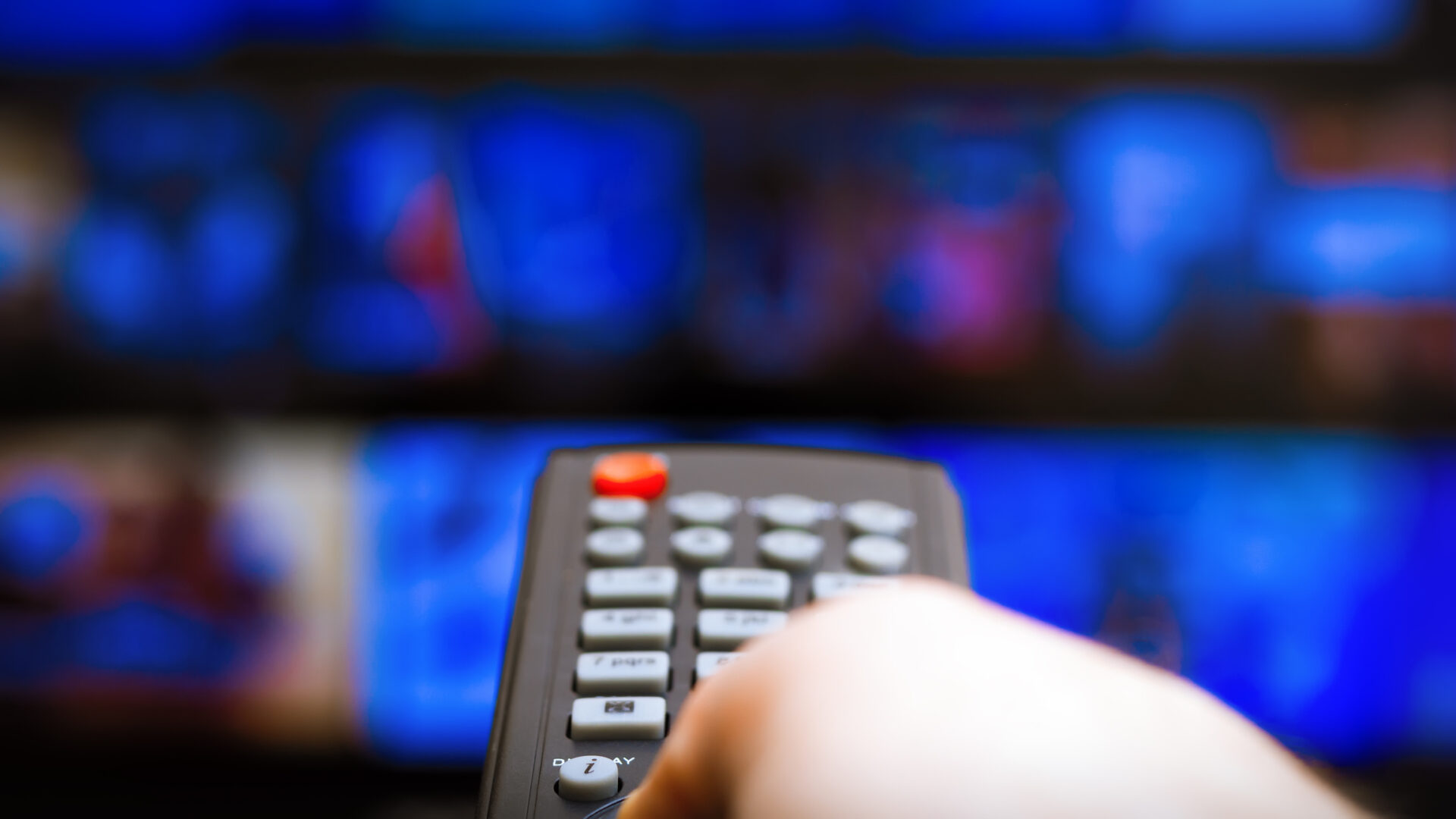 TV remote in hand